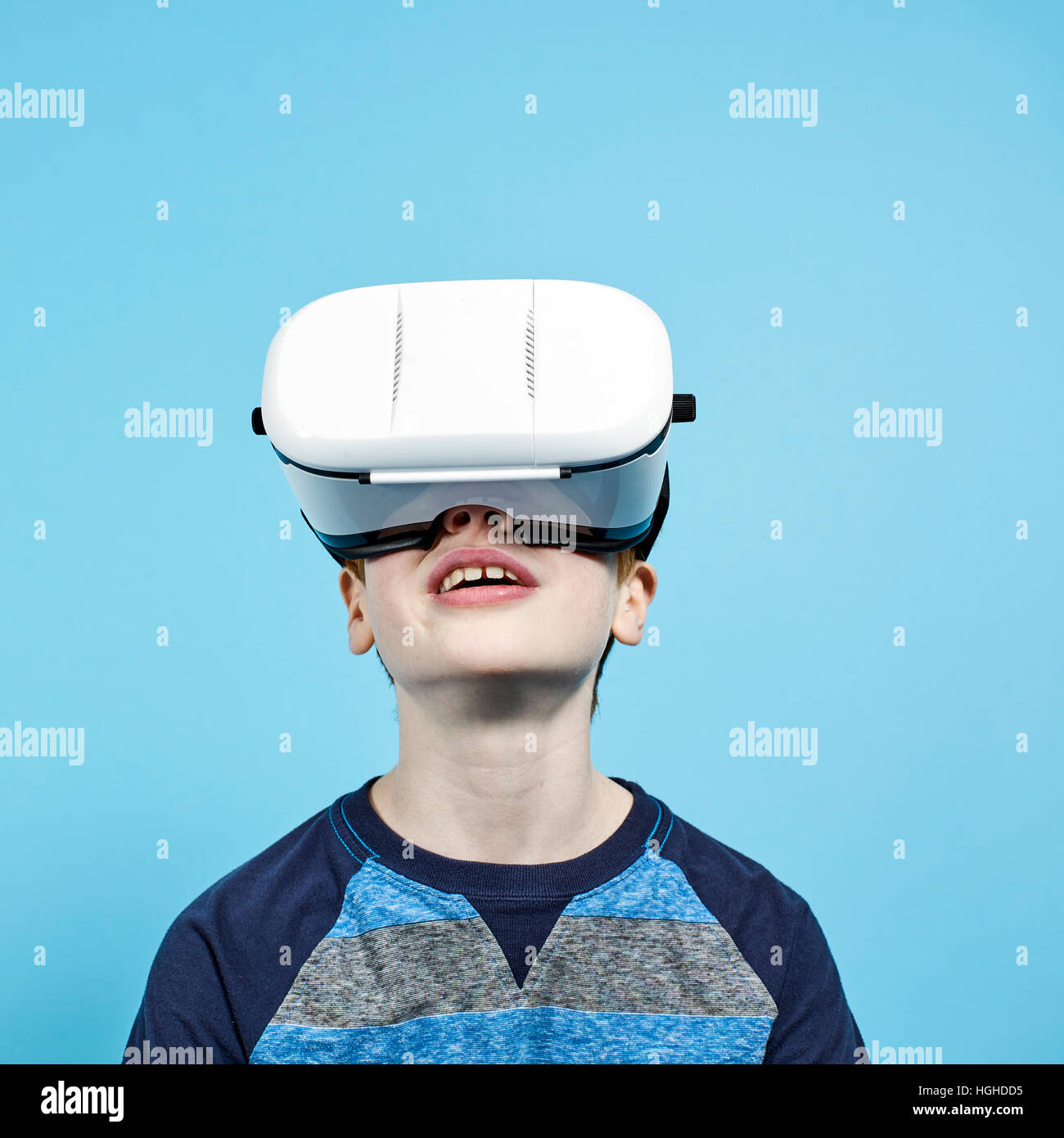 boy 10yo wearing VR headset, VR Glasses Stock Photo