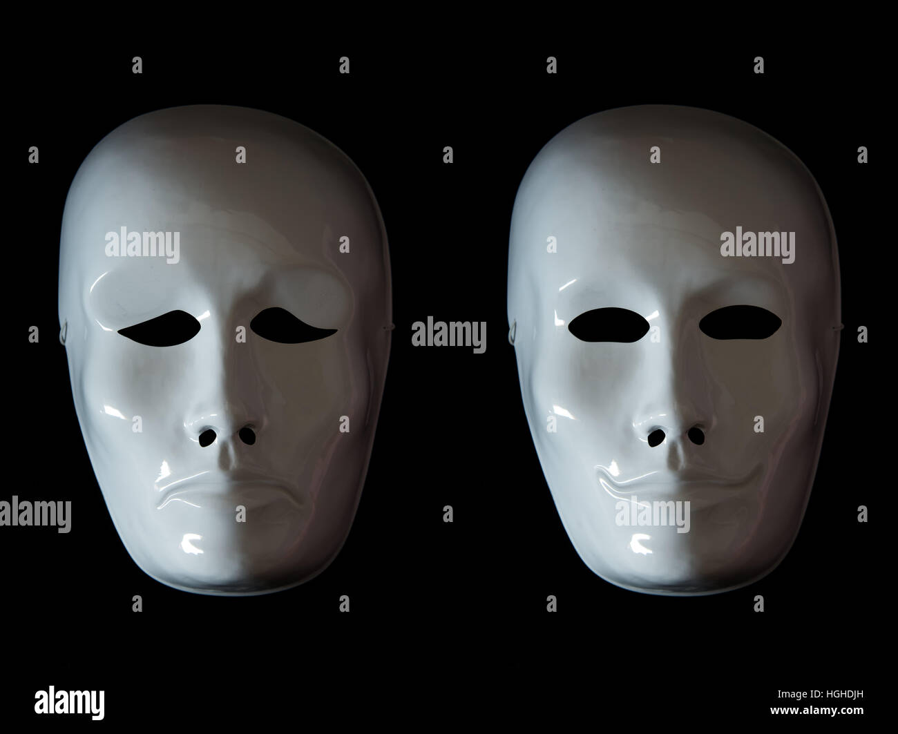 Bipolarity concept expressed with theater masks Stock Photo