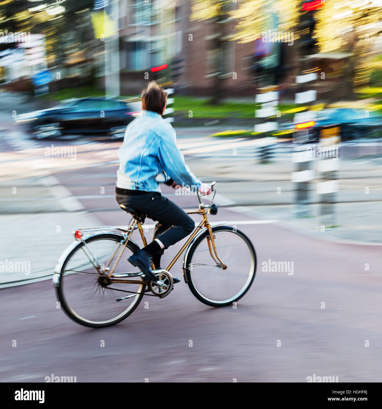Riding a bicycle with motion blur hi-res stock photography and images ...