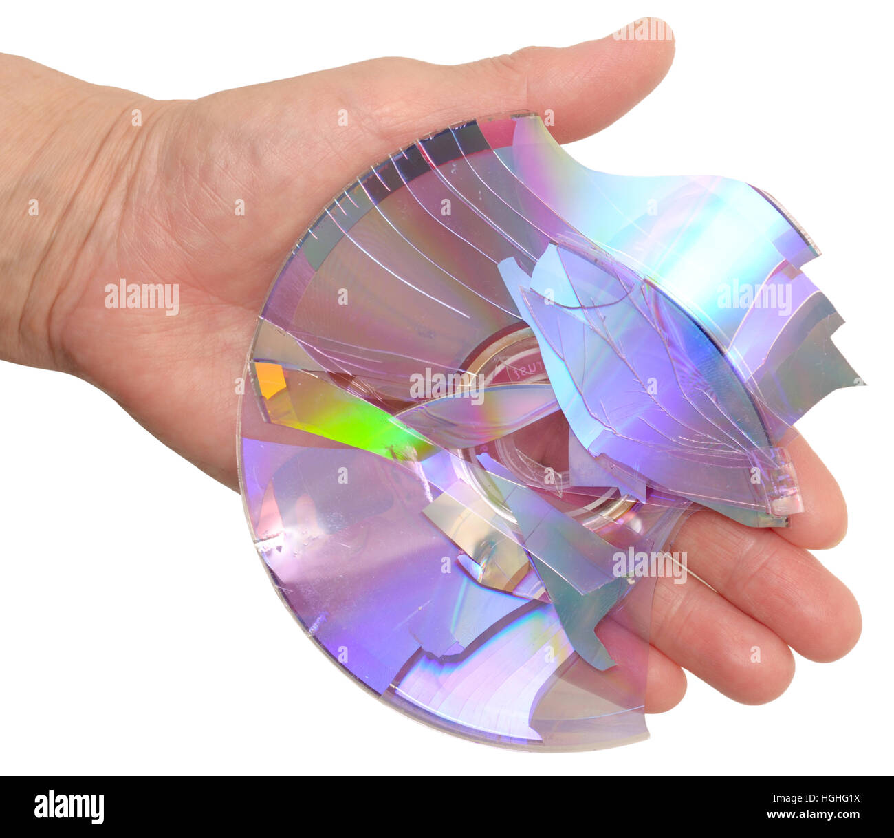 broken cd or dvd disk in hand isolated on white Stock Photo