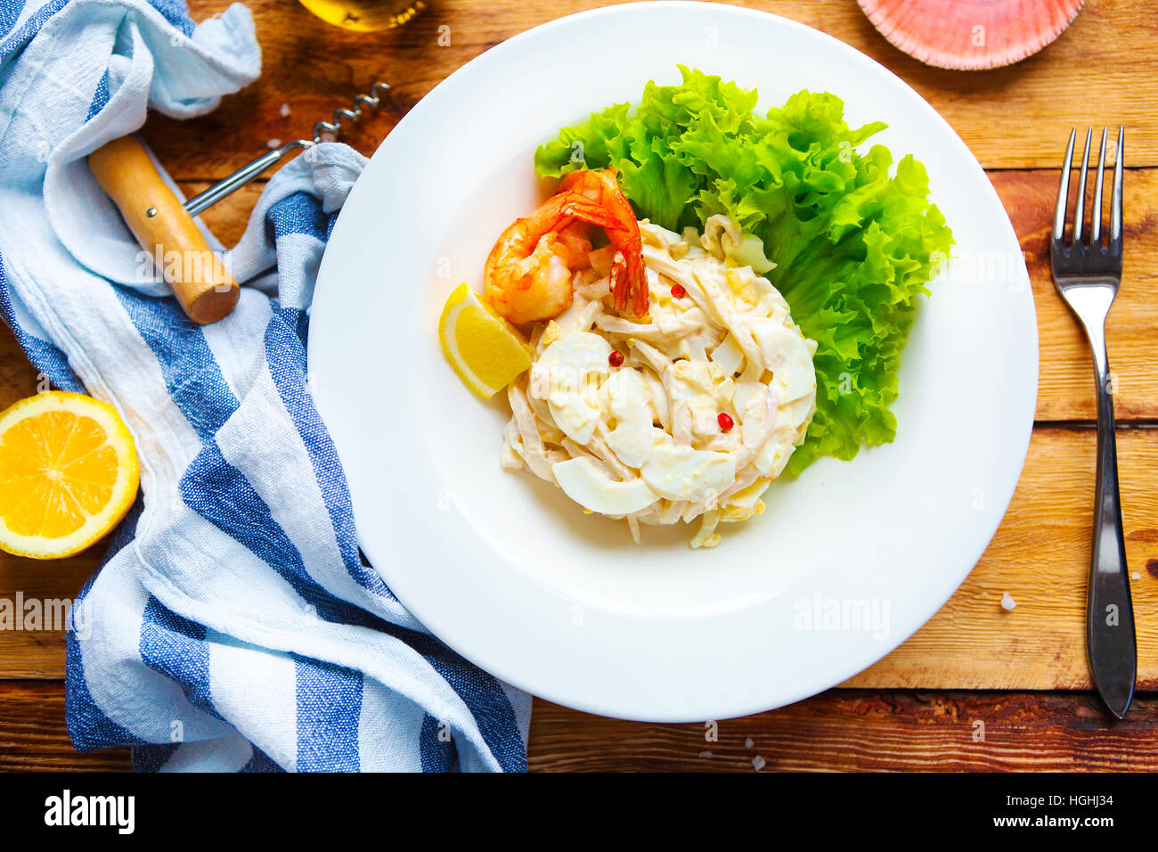 Seafood salad on wooden table Stock Photo Alamy