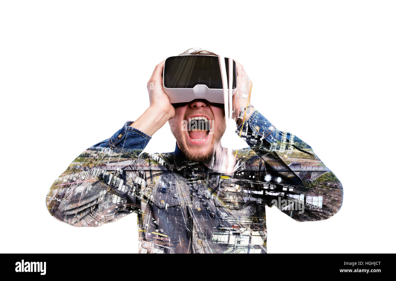 Double exposure. Man wearing virtual reality goggles. Highway Stock ...