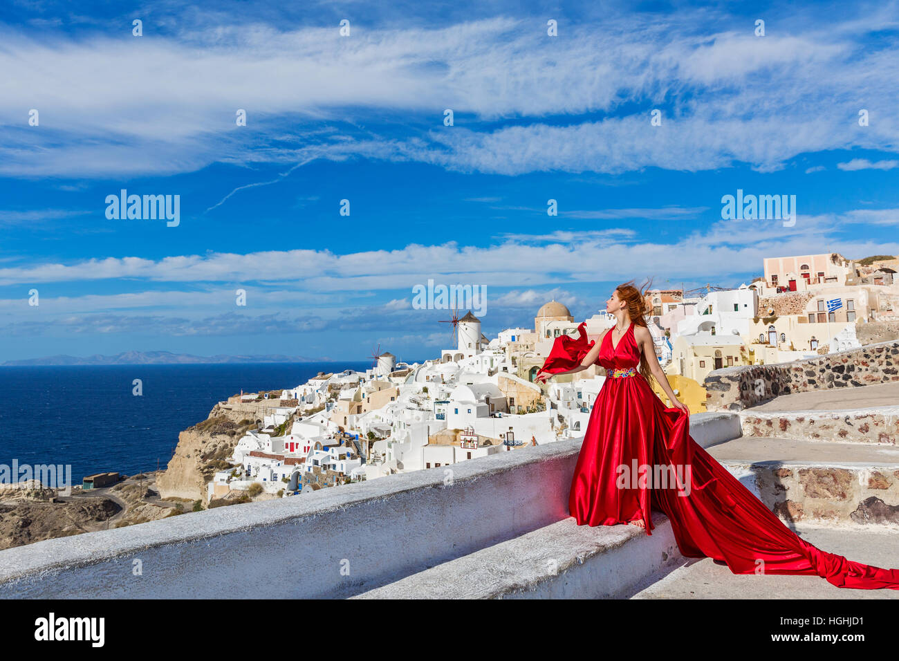 Beautiful young woman in red dress Stock Photo - Alamy
