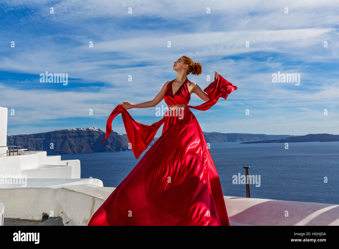 Woman in a beautiful red dress Stock Photo - Alamy
