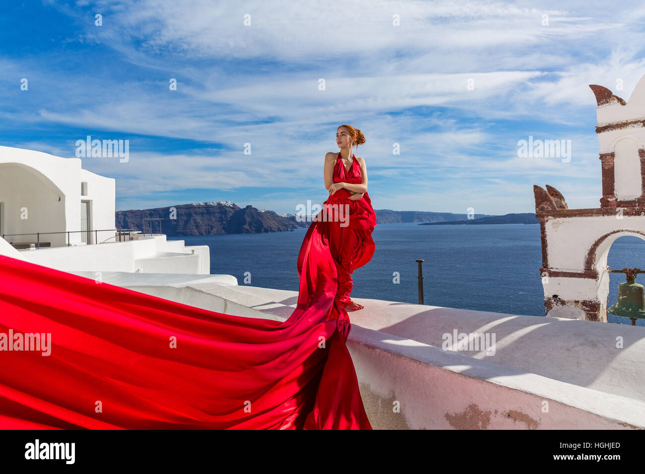 Woman in a beautiful red dress Stock Photo - Alamy