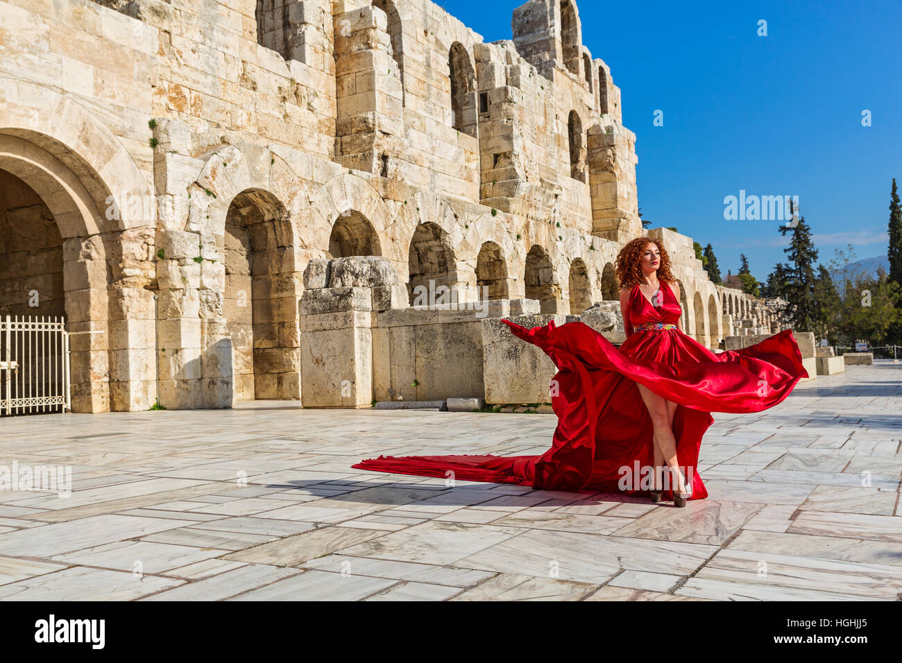 Woman in red beautiful dress Stock Photo - Alamy