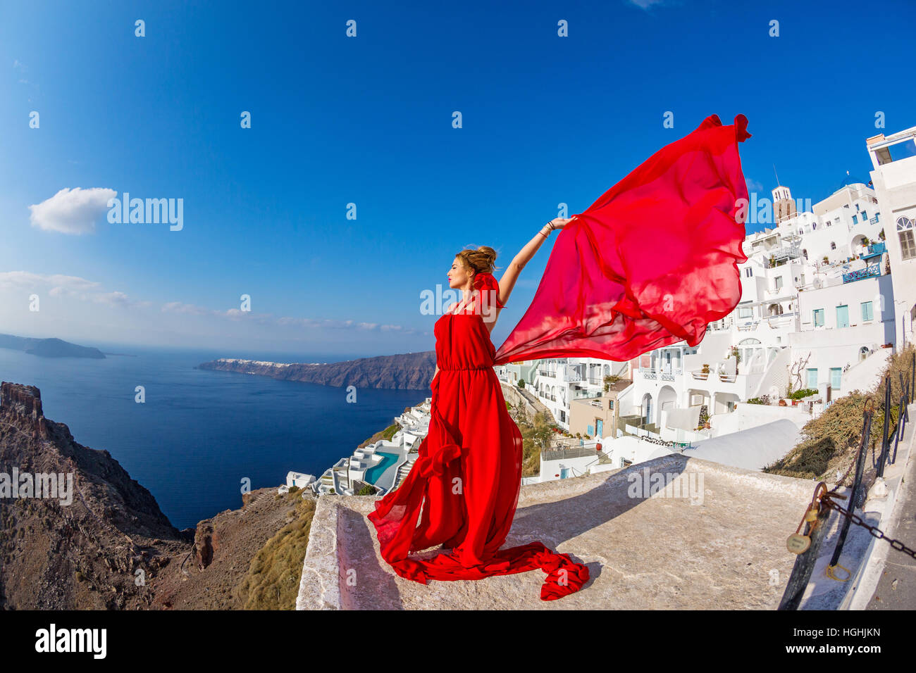 Woman in a beautiful red dress Stock Photo - Alamy