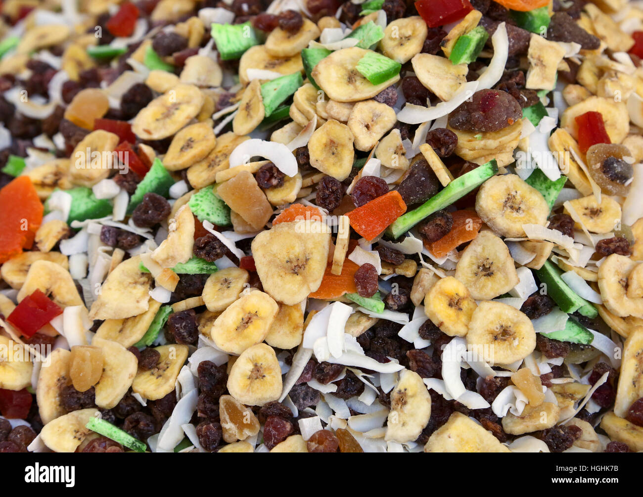 background with a lot of dried fruit with banana coconut and other tropical fruits for sale at market Stock Photo