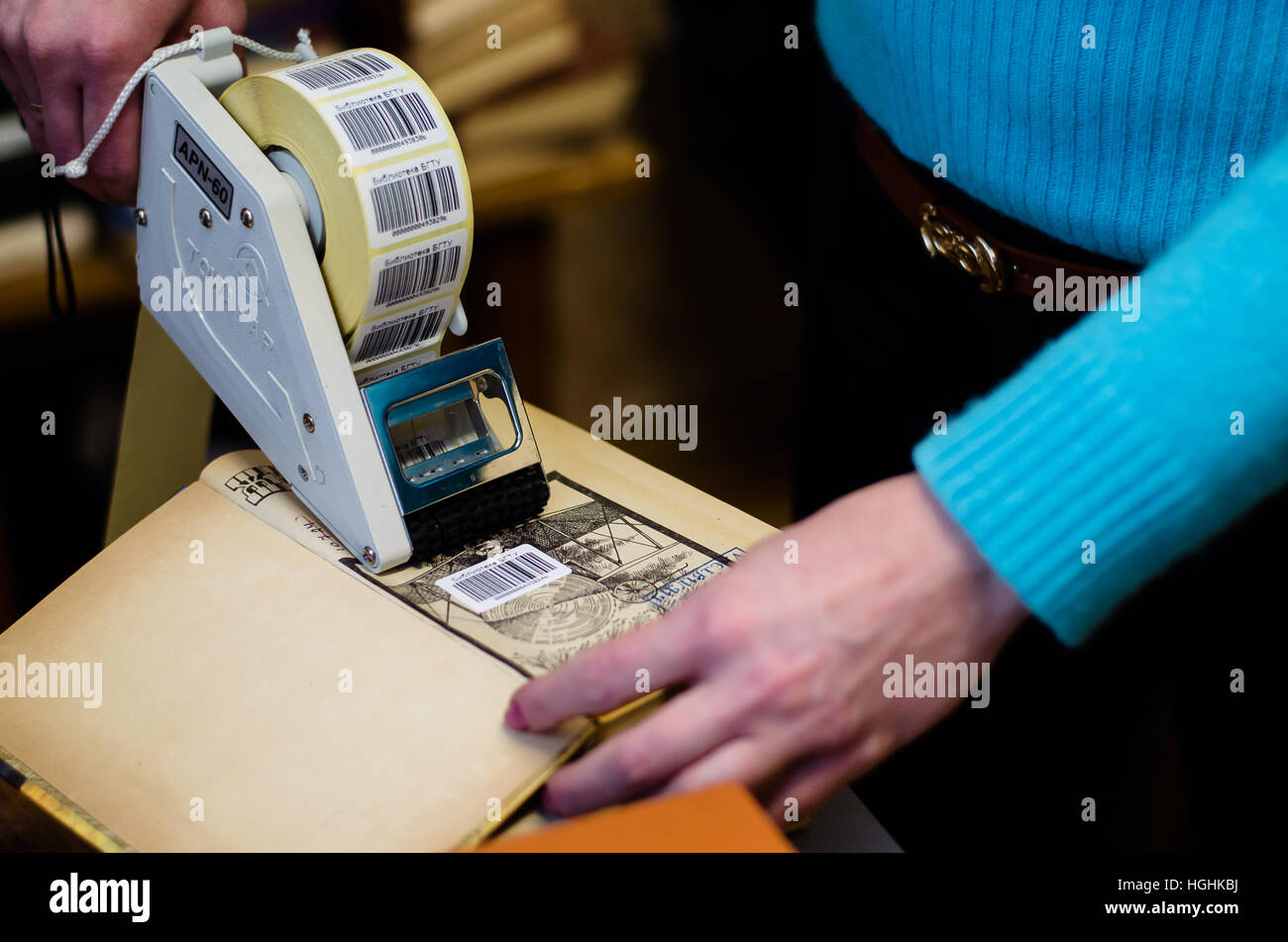 bar code's sticker applying machine Stock Photo Alamy