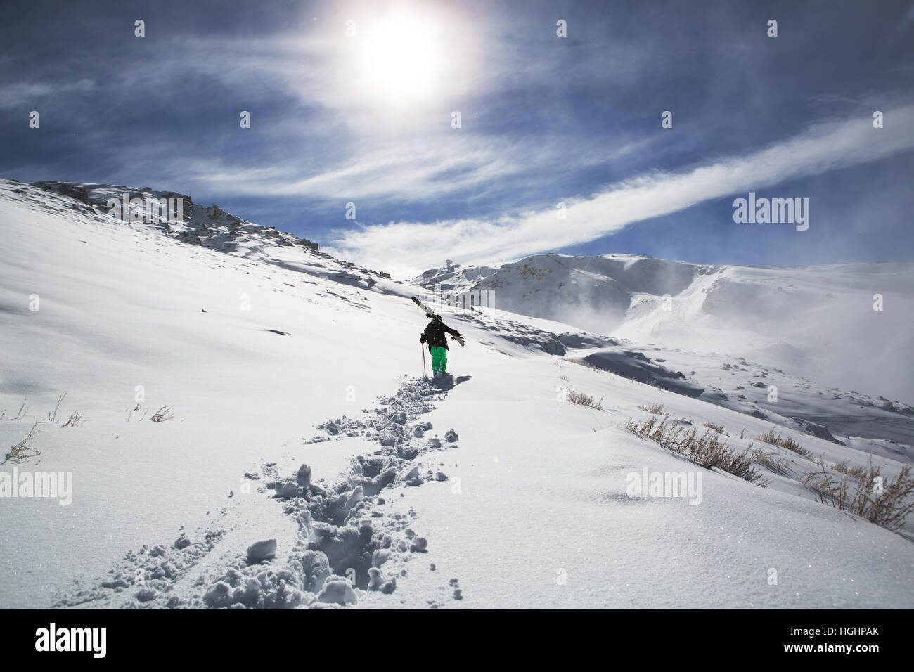 Granada, Spain. 8th of December, 2016. Kevin Blanc a professional freerider skier walks in the snow, atop the Sierra Nevada. Stock Photo