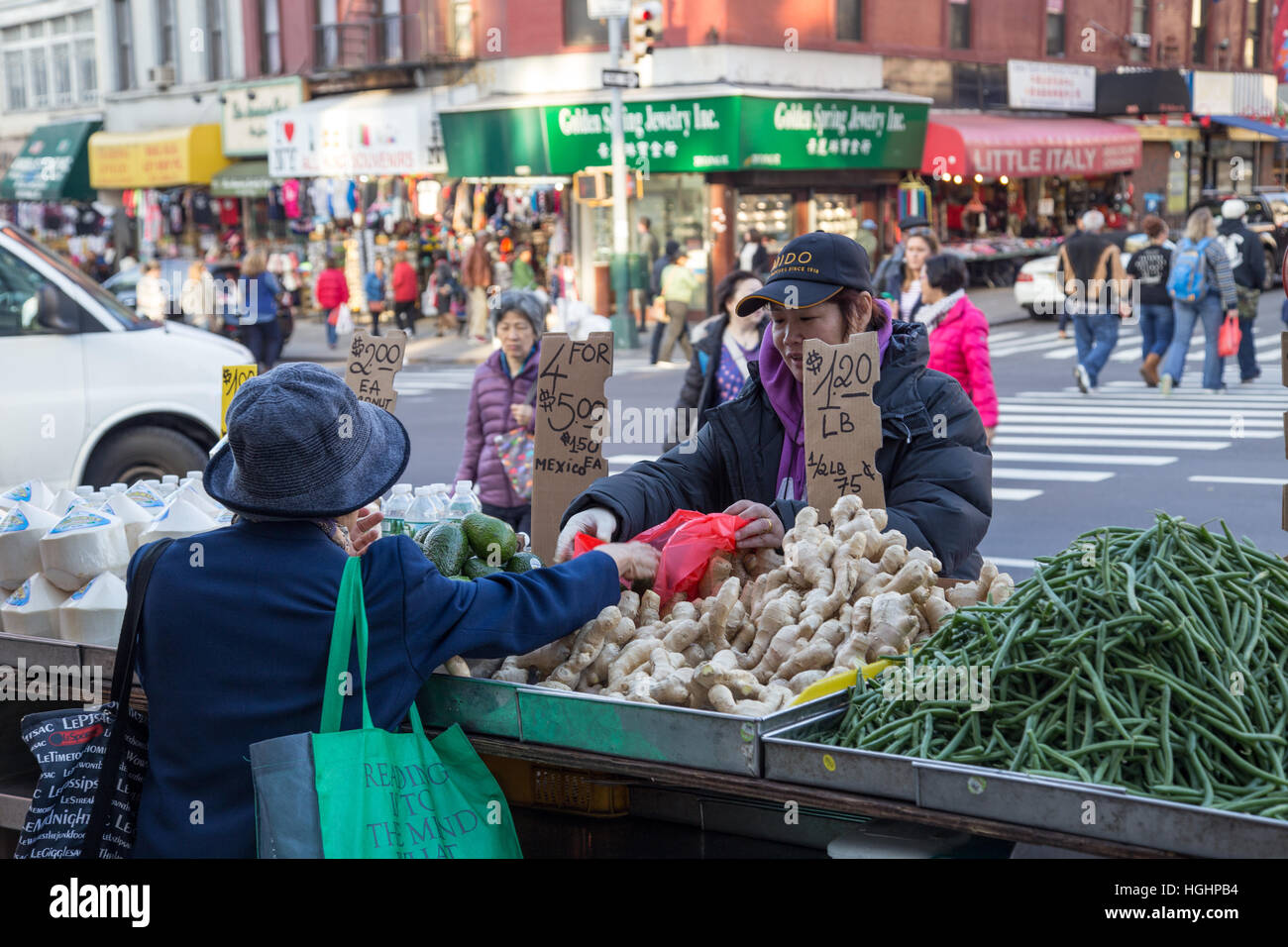 New York, United States of America - November 11, 2016: Market seller in Chinatown district in Manhattan Stock Photo