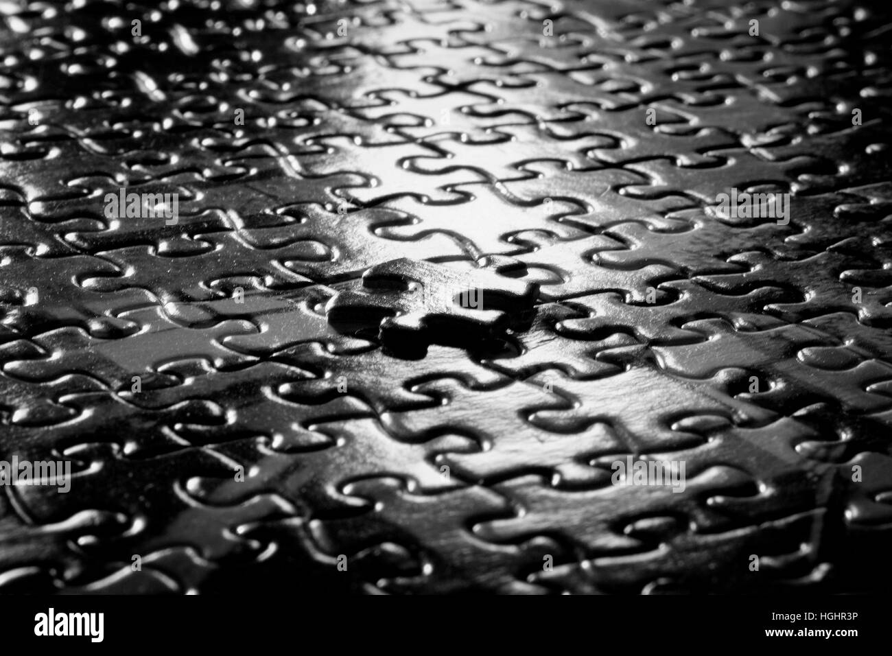 Table Surface with puzzle pieces on it showing success Stock Photo