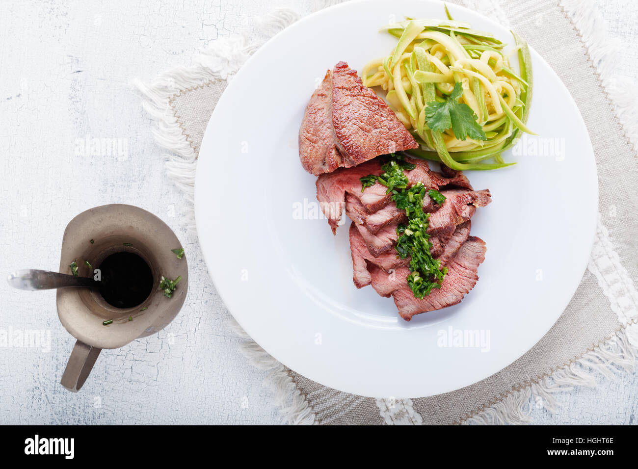 Zucchini pasta and meat Stock Photo