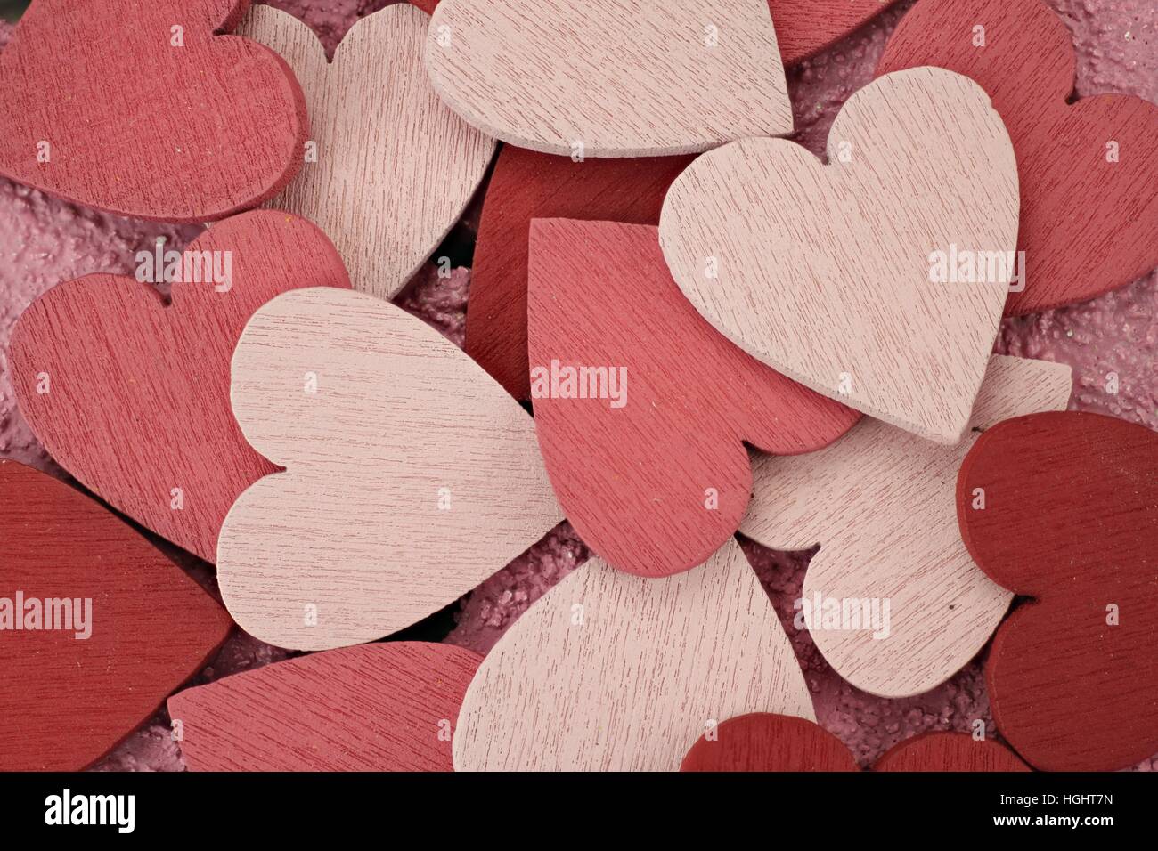 Background consisting of many hearts of wood Stock Photo