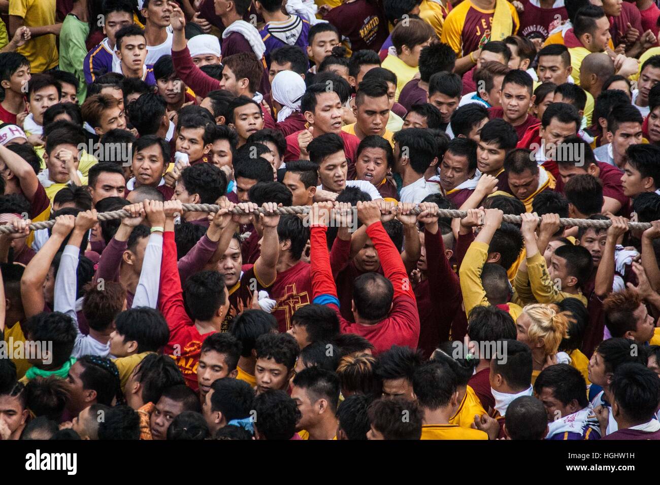Manila, Philippines. 9th Jan, 2017. Devotees scuffle for the rope that ...