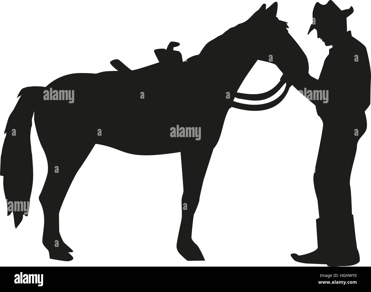 Cowboy talking to his horse silhouette Stock Photo