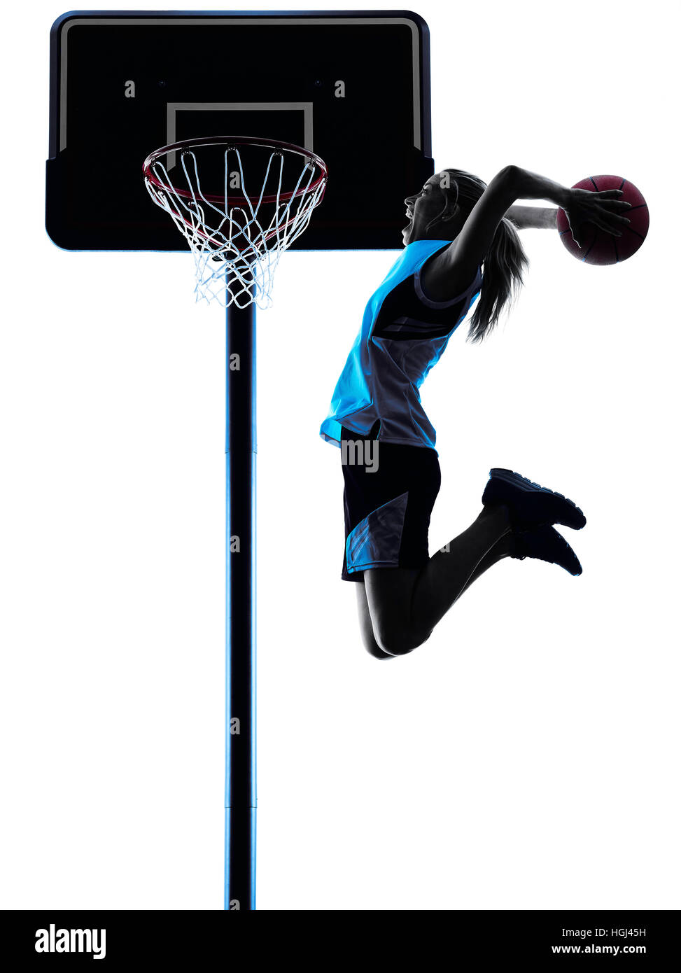 one caucasian woman basketball player dribbling in silhouette isolated