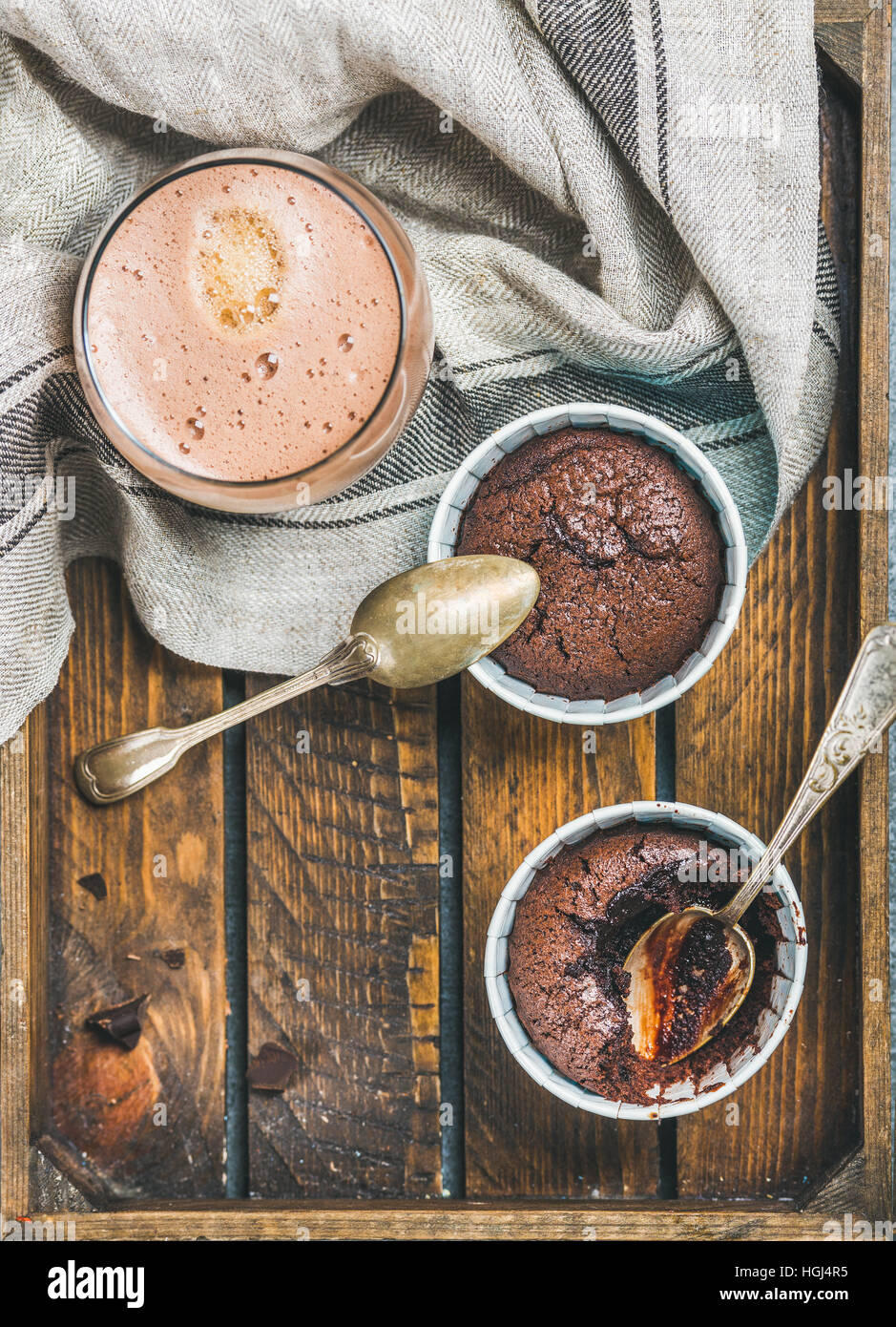 Chocolate souffle in baking cups and mocha coffee, copy space Stock