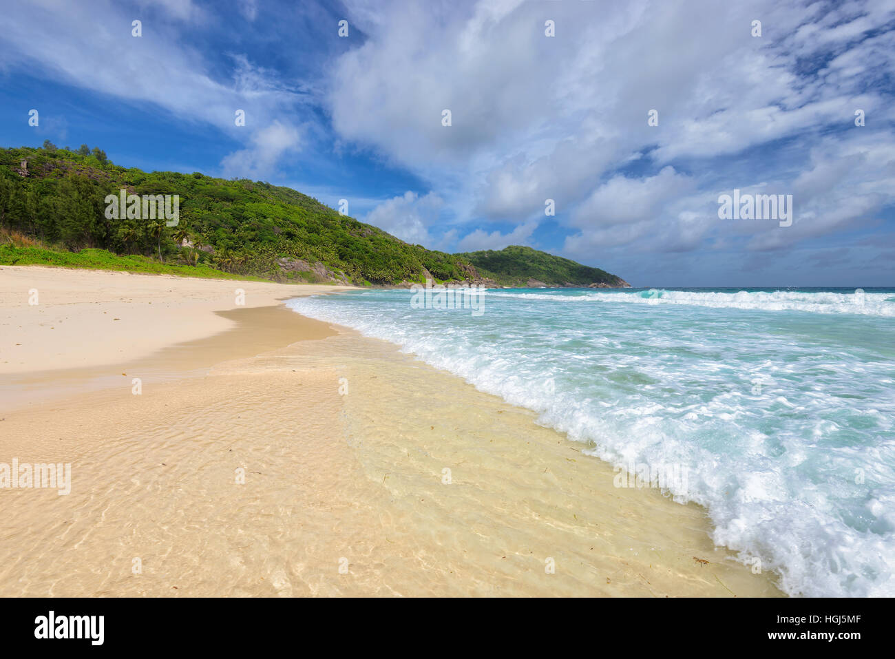 Tropical beach on Mahe island in Seychelles Stock Photo