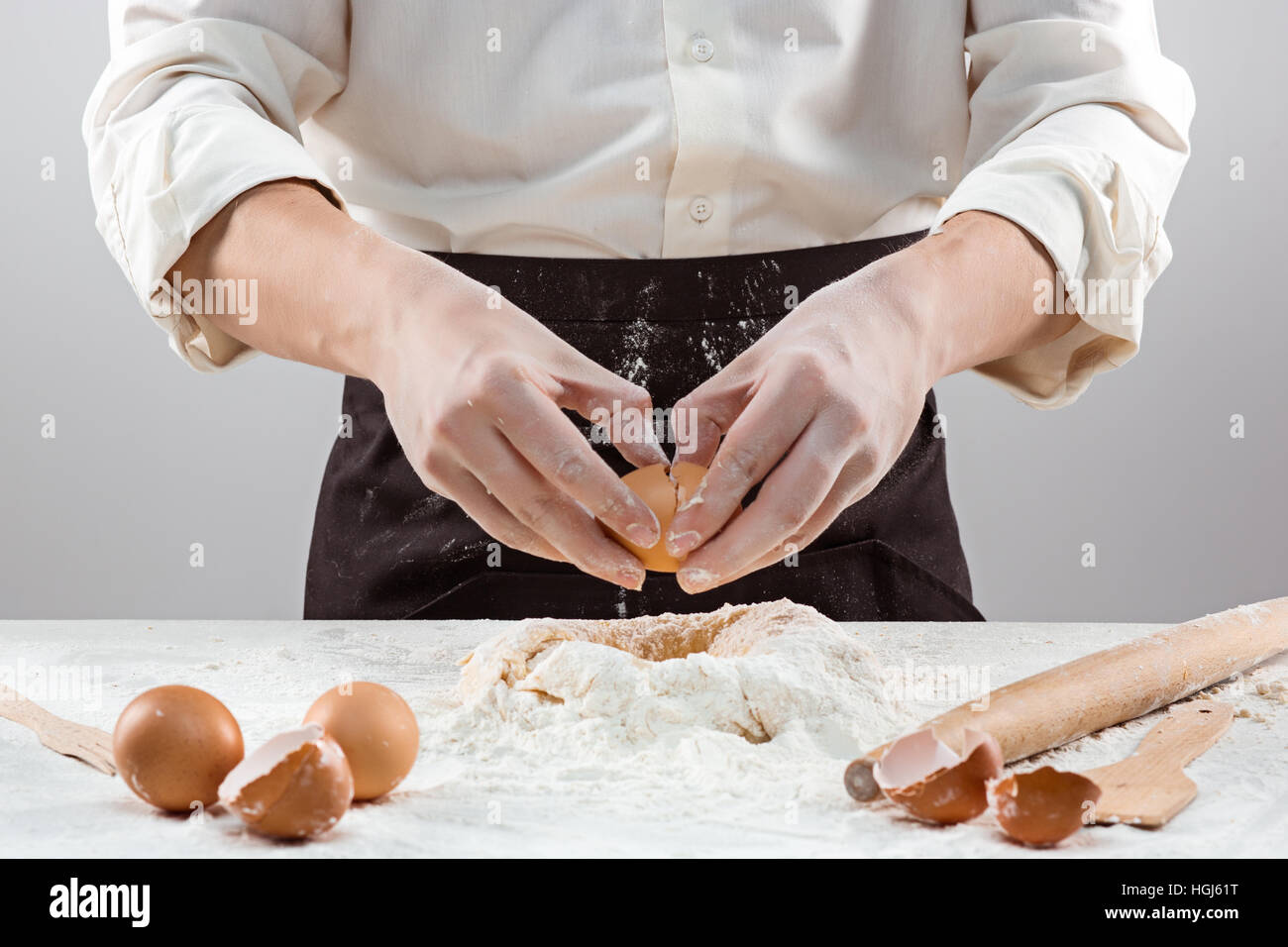Hands kneading a dough Stock Photo - Alamy