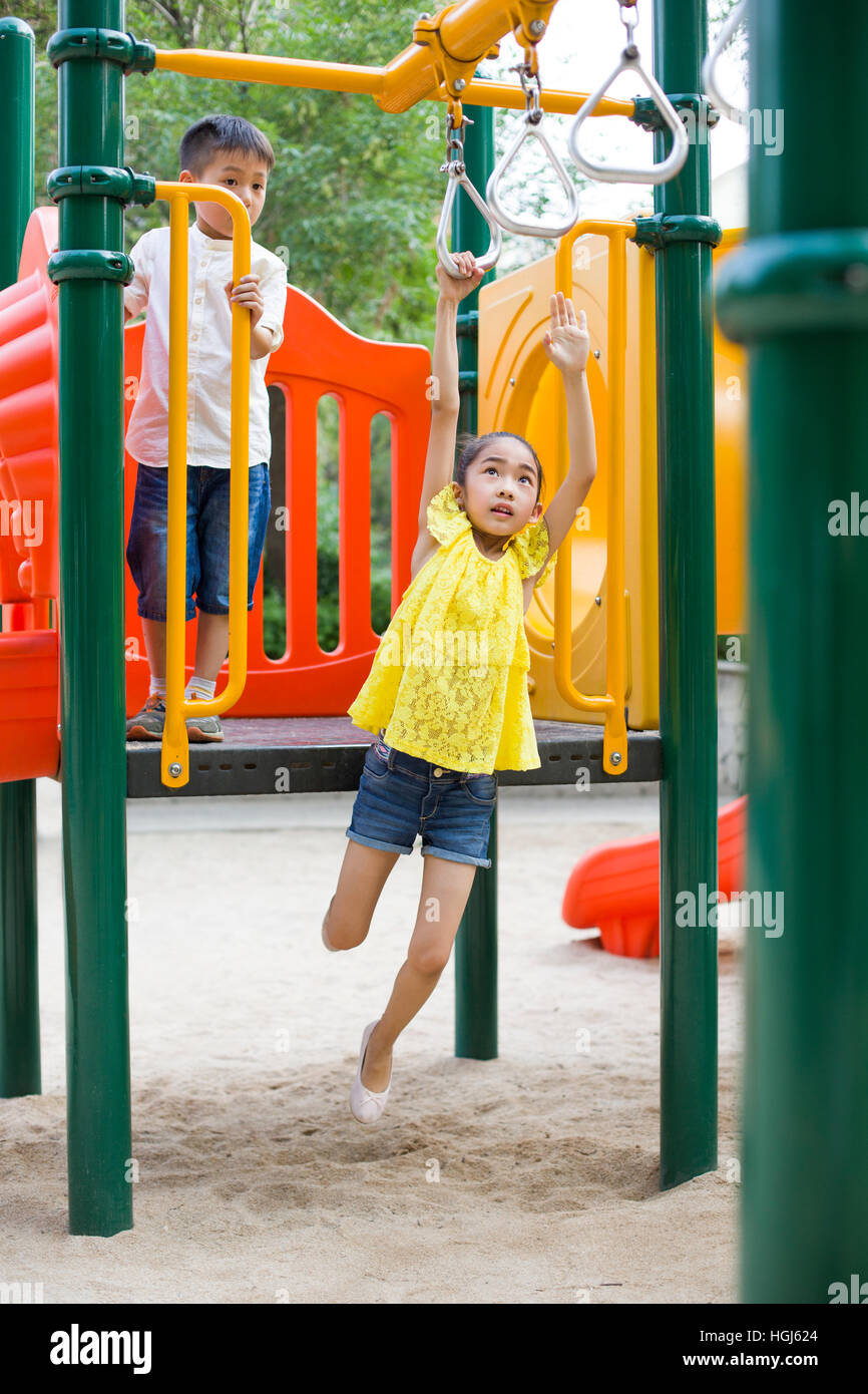 Happy children playing in park Stock Photo - Alamy