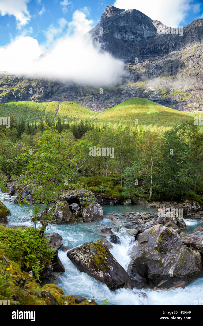 Norwegian landscape with milky blue glacier river near Trollstigen Stock Photo