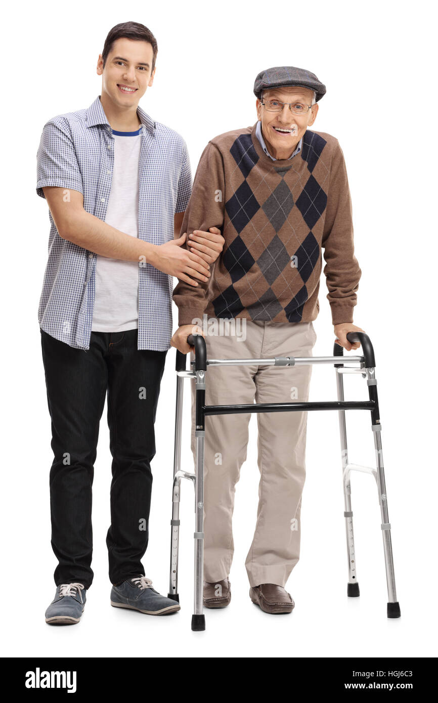 Full length portrait of a young man helping a mature man with a walker ...