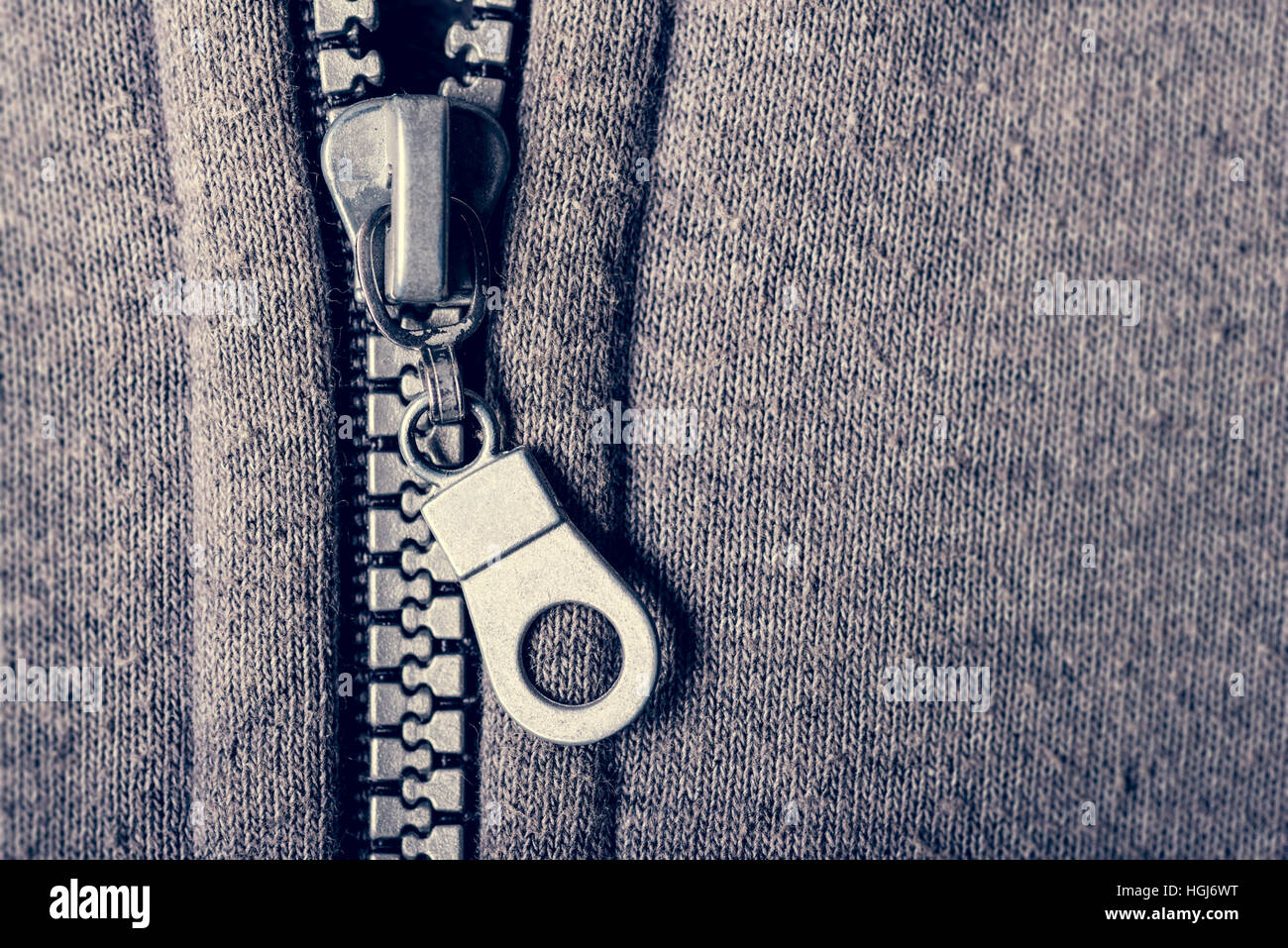 Gray plastic zipper opening jacket with copyspace Stock Photo - Alamy