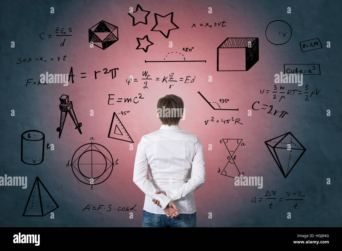 Business person standing in front of mathematical formula. Science concept. Stock Photo