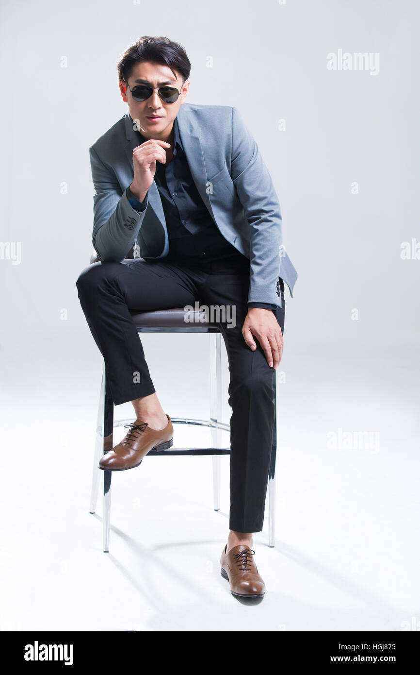 Portrait of fashionable young man Stock Photo - Alamy
