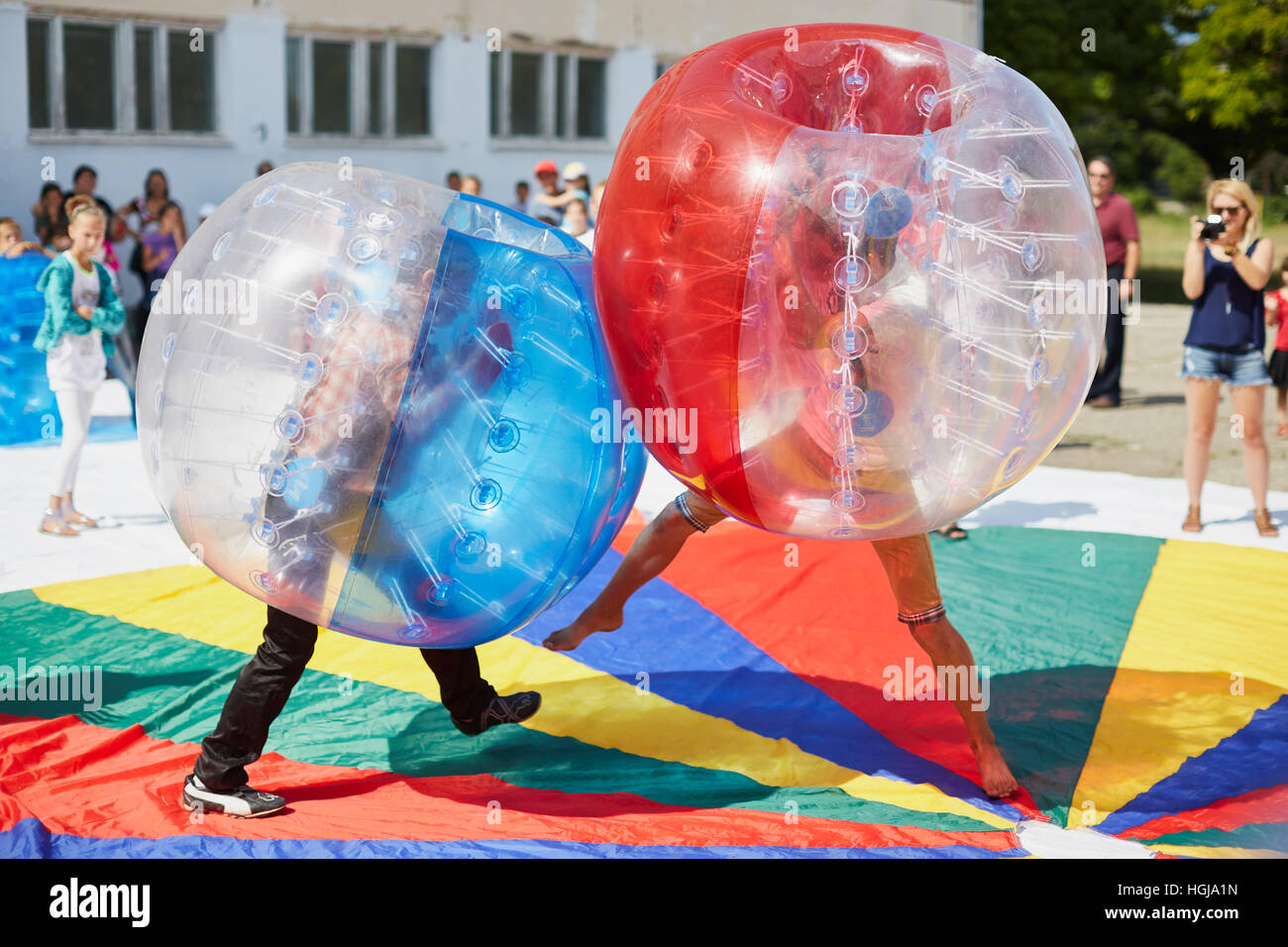 Bubble bump. Team game outdoor. Fun for teenagers. Stock Photo