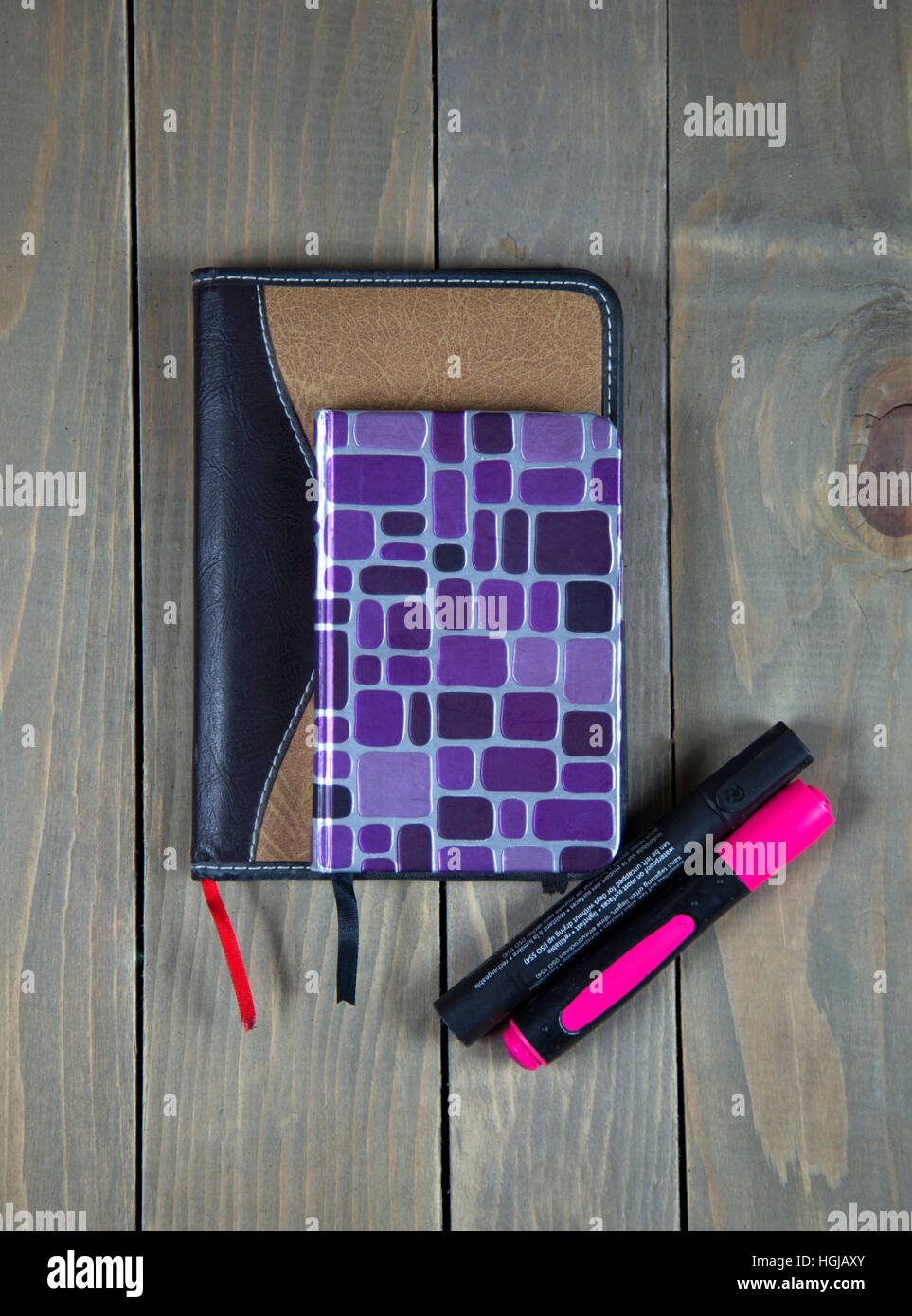 notebooks with pens on wood background Stock Photo