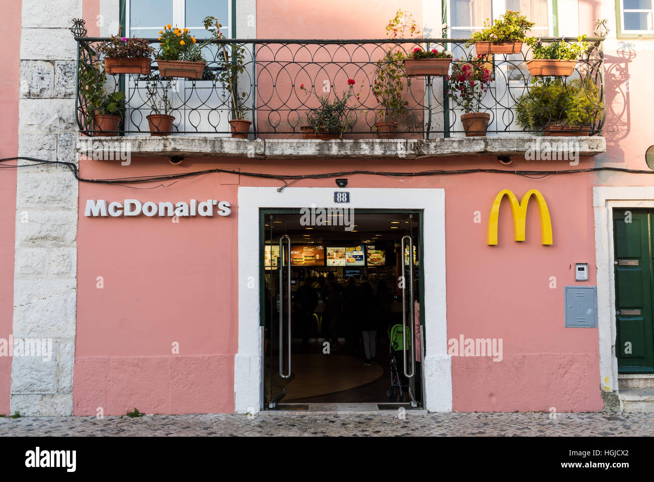 the entrance to a McDonald's restaurant established in a traditional