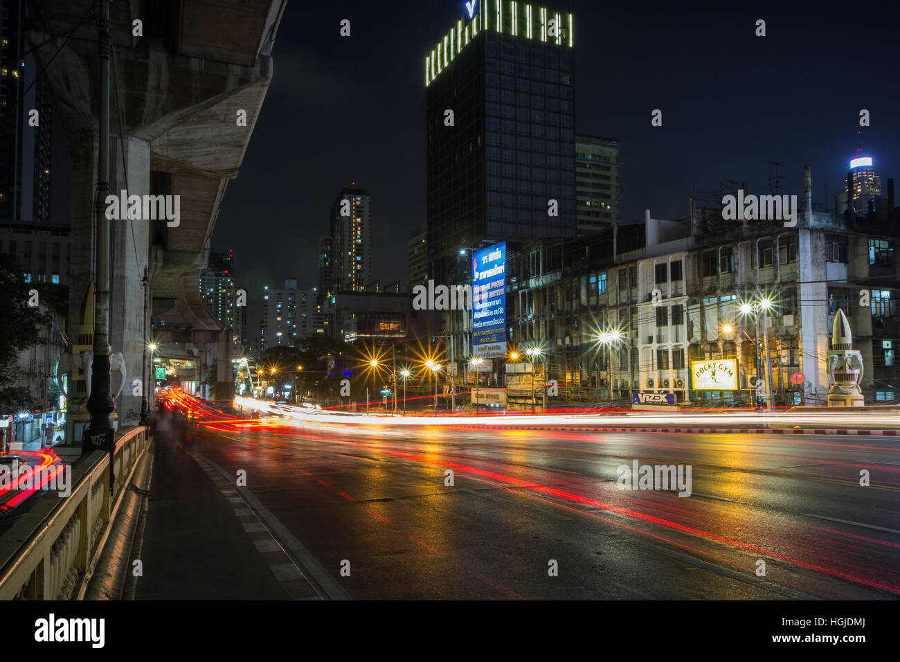 Light trails of vehicles on the Phaya Thai Road in Bangkok, Thailand, at night. Stock Photo