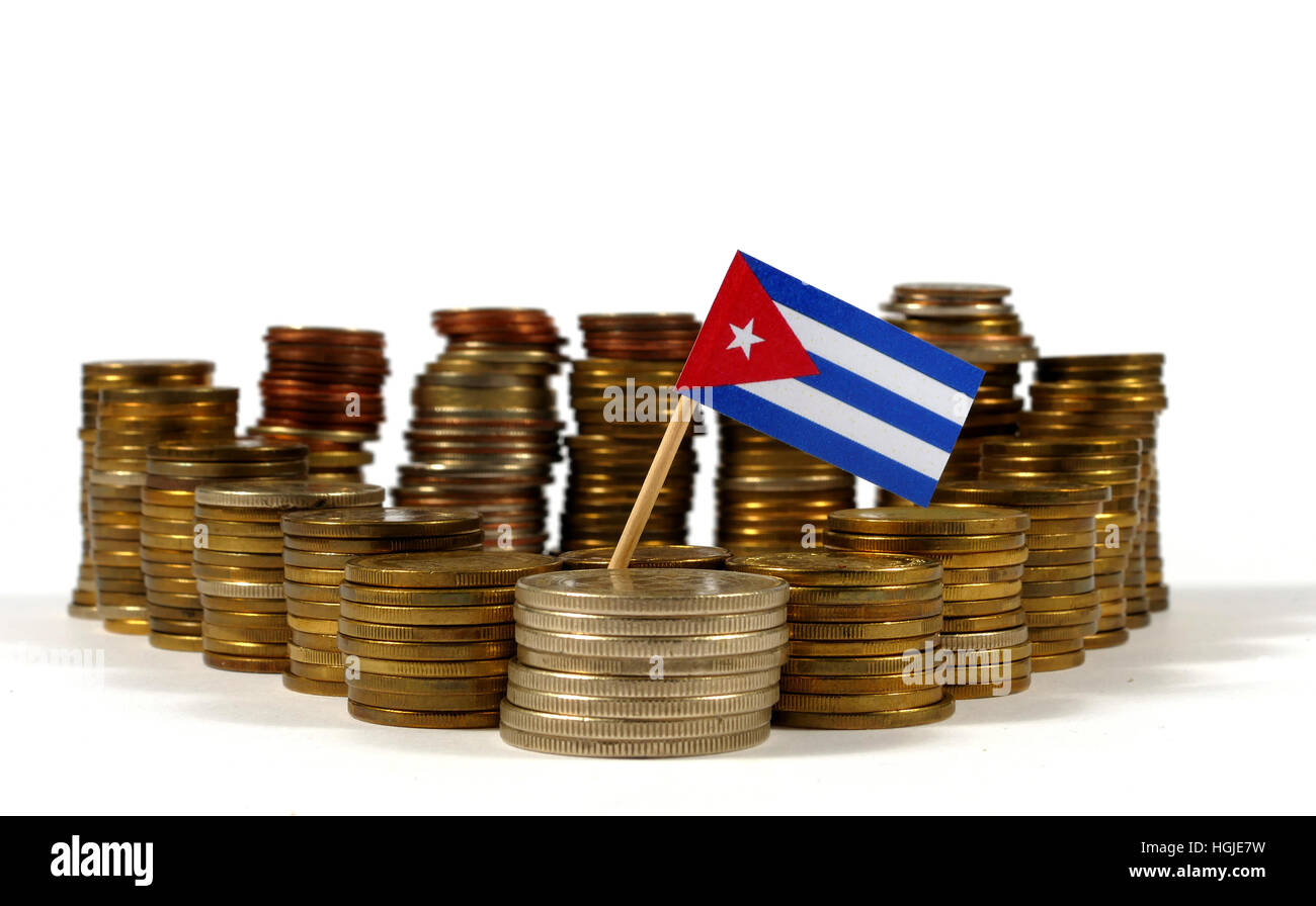 Cuba flag waving with stack of money coins Stock Photo