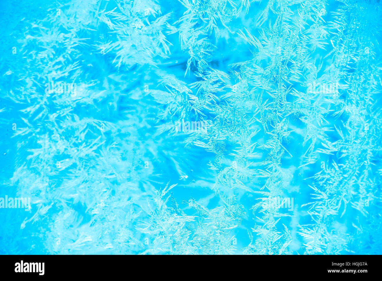 frost pattern on glass winter background texture Stock Photo - Alamy