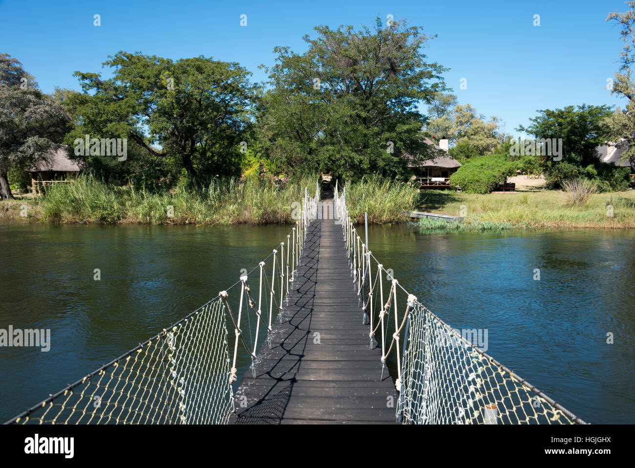 Suspension bridge over the Okavango River, Mobola Lodge, Rundu, Namibia Stock Photo
