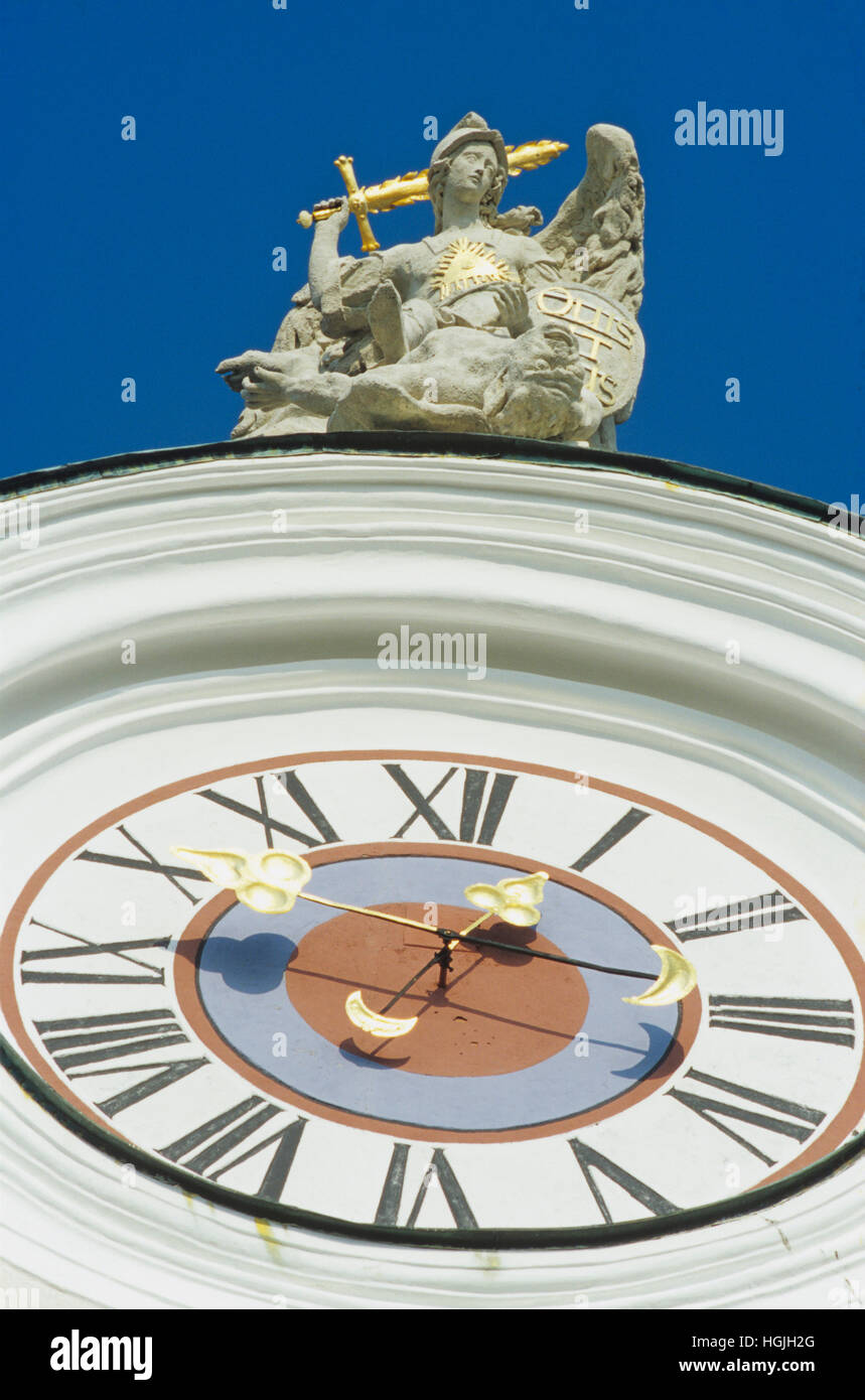 Clock and sculpture of Pilgrimage church Sonntagberg Stock Photo