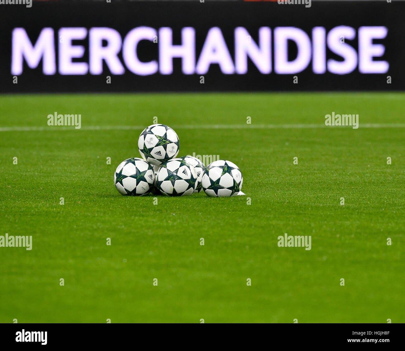Footballs, match balls with Champions League Logo in front of perimeter advertisement, MERCHANDISE, Allianz Arena, Munich Stock Photo