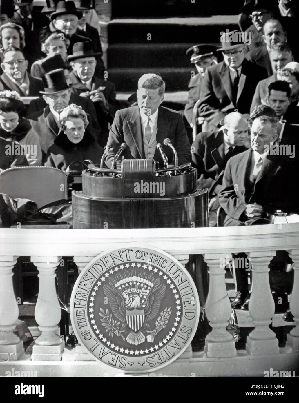United States President John F. Kennedy delivers his Inaugural Address after being sworn-in as the 35th President of the United States on the East Front of the U.S. Capitol in Washington, DC on Friday, January 20, 1961. U.S. Vice President Lyndon B. Johnson looks on from right.Credit: Arnie Sachs/CNP - NO WIRE SERVICE - Photo: Arnie Sachs/Consolidated News Photos/Arnie Sachs - CNP Stock Photo