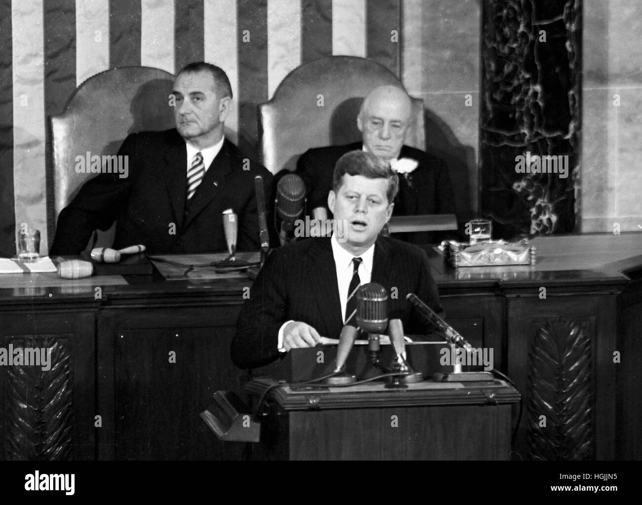 United States President John F. Kennedy outlined his vision for manned exploration of space to a Joint Session of the United States Congress, in Washington, DC on May 25, 1961 when he declared, '.I believe this nation should commit itself to achieving the goal, before this decade is out, of landing a man on the Moon and returning him safely to the Earth.' This goal was achieved when astronaut Neil A. Armstrong became the first human to set foot upon the Moon at 10:56 p.m. EDT, July 20, 1969. Shown in the background ar US Vice President Lyndon B. Johnson, left, and Speaker of the House Sam T. Stock Photo