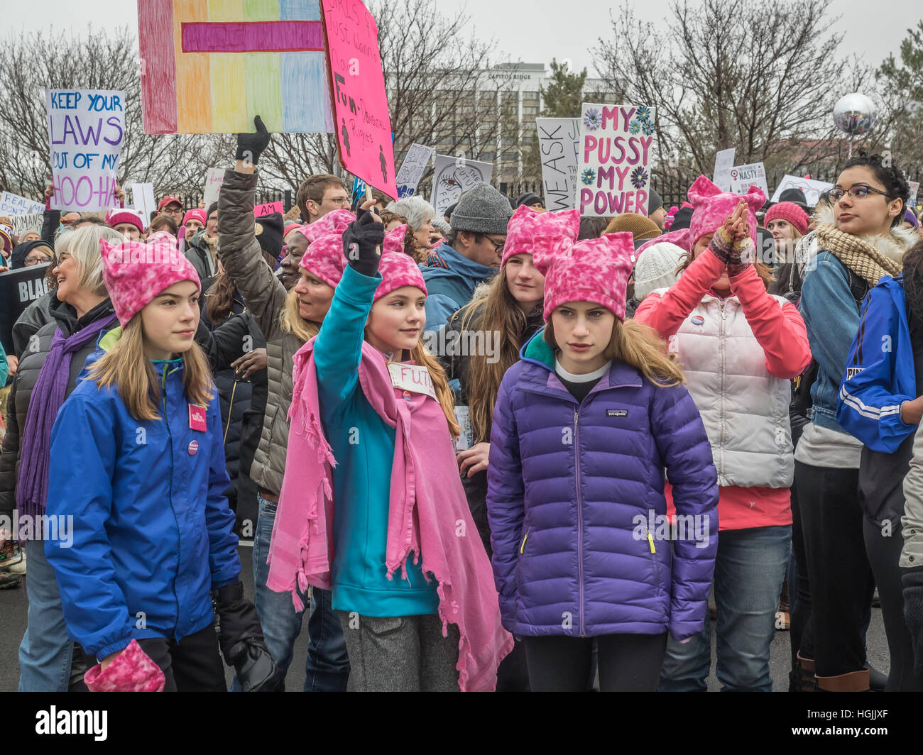 Saint Paul, Minnesota, USA. 21st January, 2017.  Young women in pink pussycat hats walk in the Women's March  in St Paul, Minnesota. Cindy Carlsson/Alamy Live News Stock Photo