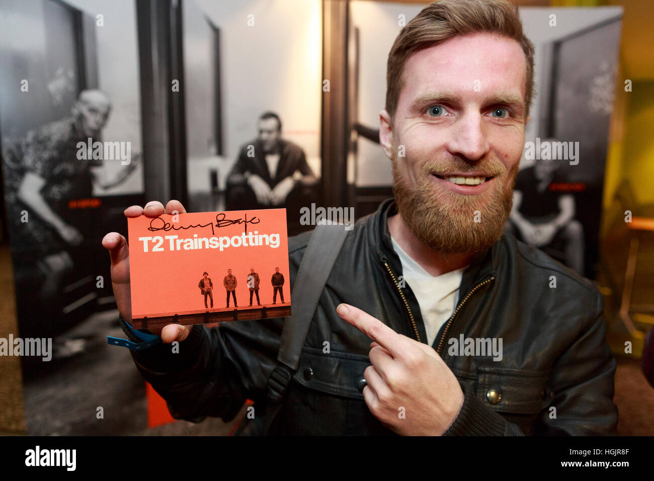 Edinburgh, UK. 22nd January, 2017. T2 Trainspotting premiere at Edinburgh Cineworld. Scotland. Pictured Kenny MacGregor member of the audience showing the T2 ticket signed by Danny Boyle.  Pako Mera/Alamy live News Stock Photo