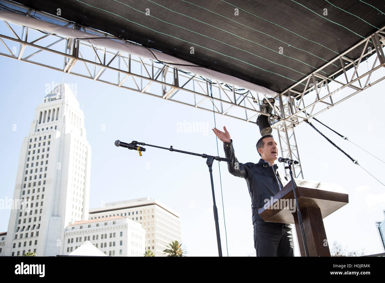 Los Angeles, USA. 21st January, 2017. Los Angeles Mayor Eric Garcetti addresses the crowd in front of Los Angeles City Hall. Thousands of Angelenos gathered in Downtown Los Angeles to march in solidarity with the Women’s March in Washington, DC, protesting Donald Trump’s policies and rhtetoric. Credit: Andie Mills/Alamy Live News Stock Photo
