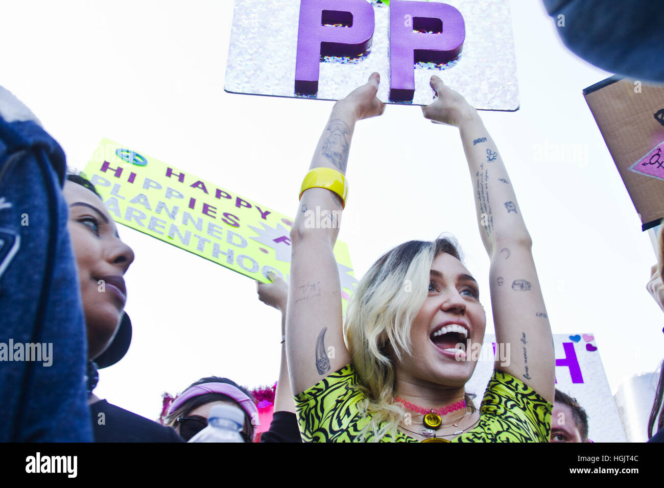 Los Angeles, California, USA. 21st Jan, 2017. MILEY CYRUS joins in as protesters fill the streets of downtown Los Angeles during the Women's March against President Trump. The march was held in in conjunction with similar events taking place in Washington and around the nation following the inauguration. Credit: Katrina Kochneva/ZUMA Wire/Alamy Live News Stock Photo