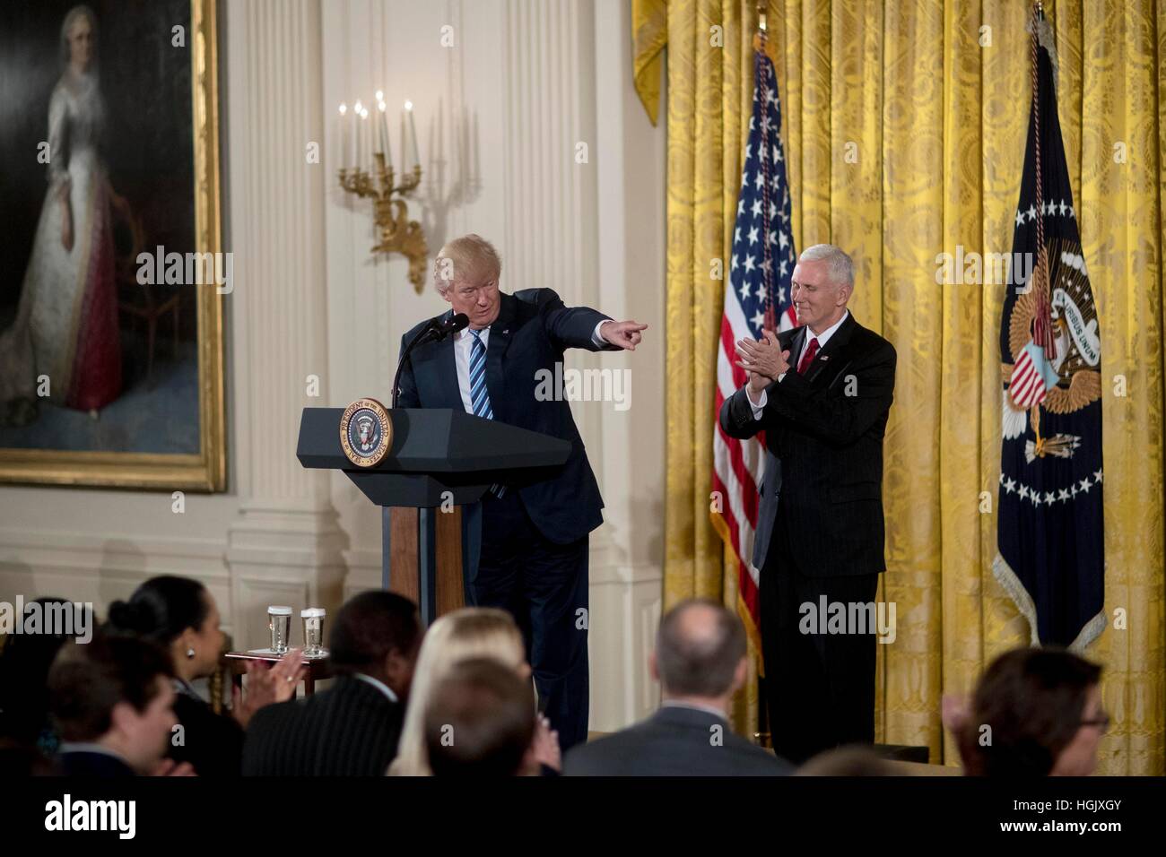 United States President Donald Trump, center, speaks as US Vice ...