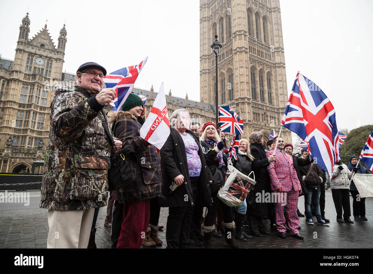 London, UK. 23rd January, 2017. Pro-Brexit rally with a colourful display of British flags outside Westminster’s Parliament Buildings. Organised by UKIP, the Brexit supporters are demanding MPs and Parliament implement the EU Referendum vote to leave Europe without further delay. © Guy Corbishley/Alamy Live News Stock Photo