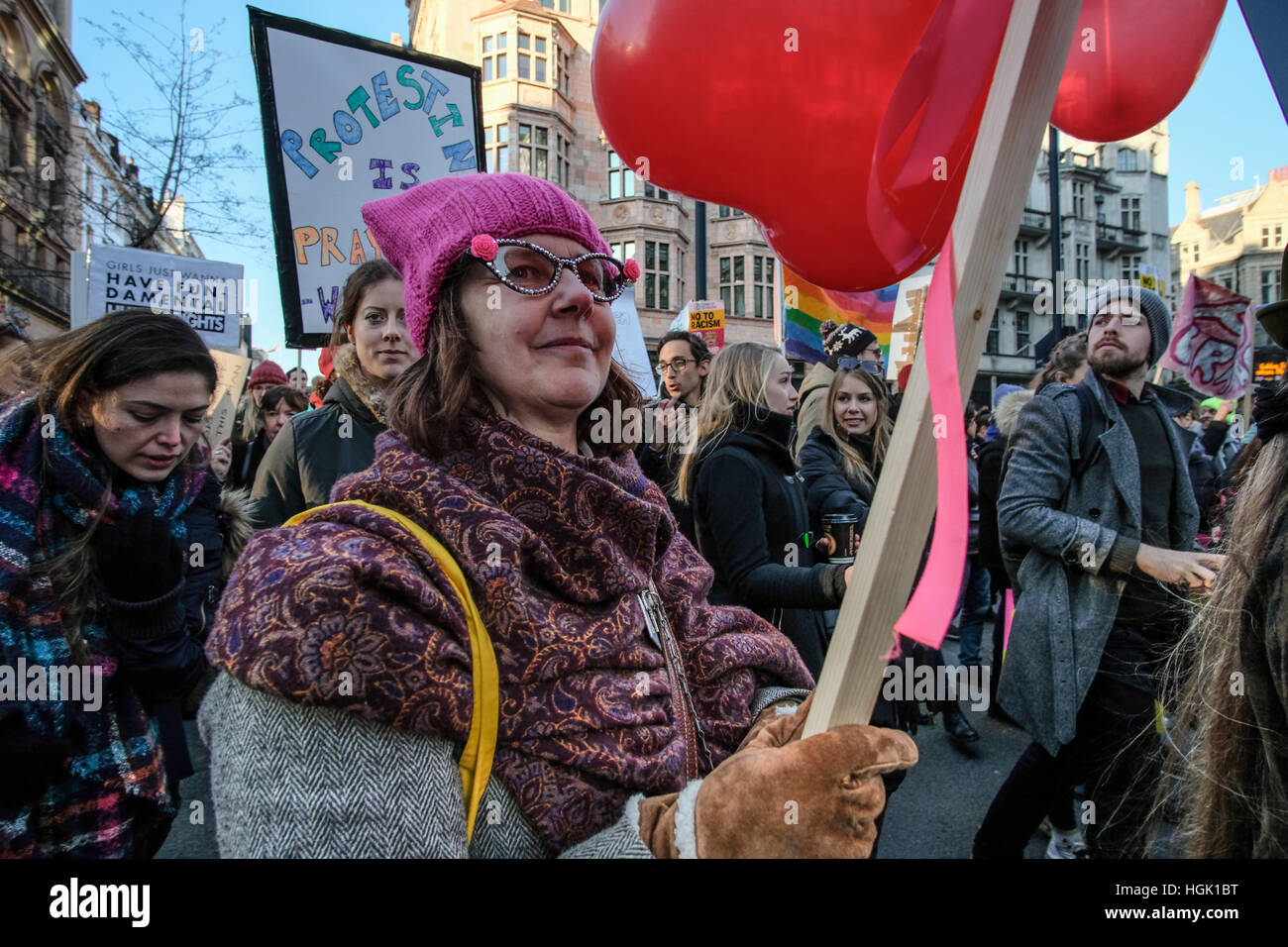London, UK. 22nd Jan, 2017. Women's Walk in London. Women with banners walking along Piccadilly. People of all genders march in London as part of an international day of action in solidarity. They unite and stand together for the dignity and equality of all peoples, for the safety and health of our planet and for the strength of our vibrant and diverse communities. Credit: Martin Pickles Alamy Live News Stock Photo