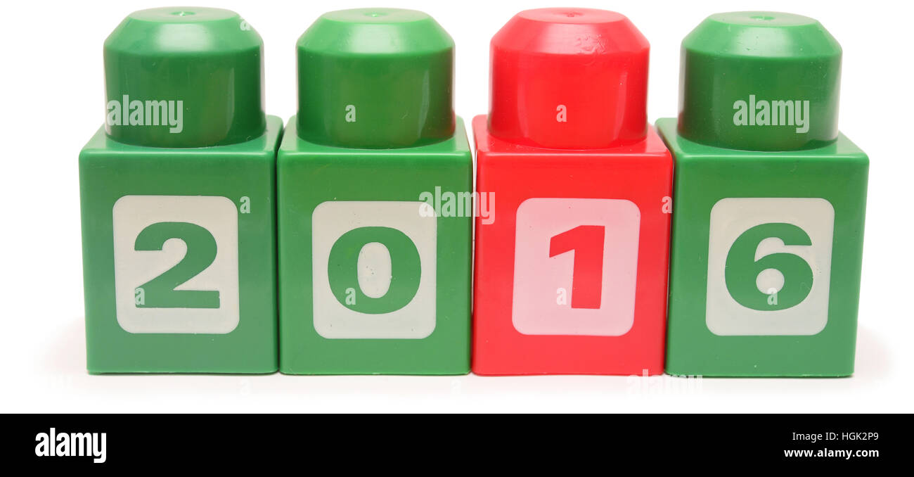 Colorful stacked toy plastic building blocks isolated on white ...