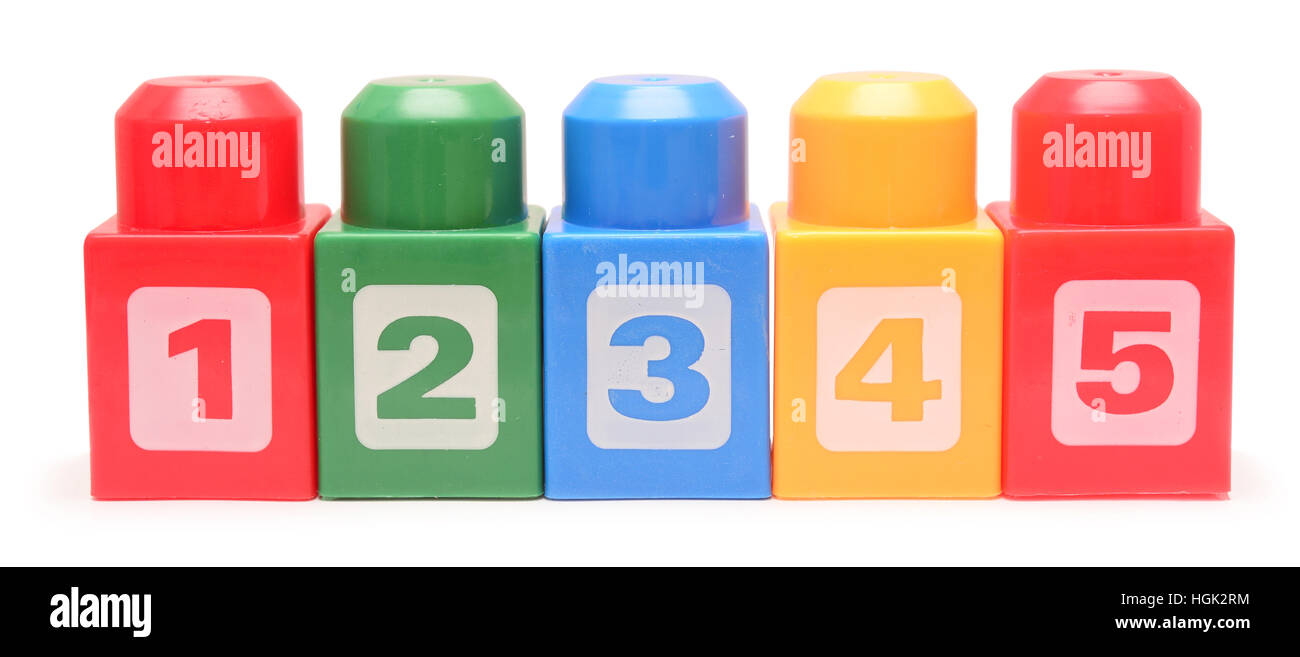 Colorful stacked toy plastic building blocks isolated on white ...